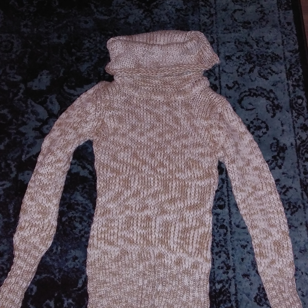 Jeans, sweater, and sleeveless top